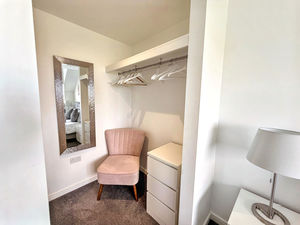 Walk-in wardrobe/dressing room in bedroom one- click for photo gallery